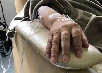 close-up-of-hand-and-arm-of-woman-receiving-chemotherapy-treatment