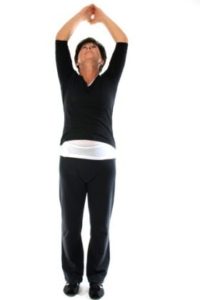 woman-demonstrating-yoga-position-mountain-tadasana