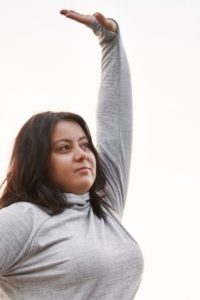 young-woman-stretching-outside