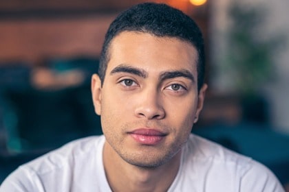 young-man-looking-straight-ahead-intense-eyes