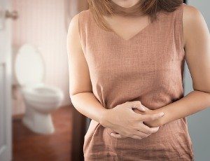 woman with upset stomach